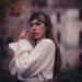 Woman in a white sweater for fall styling inspiration; not a specific product. Photo by mhajr invincible via Unsplash.